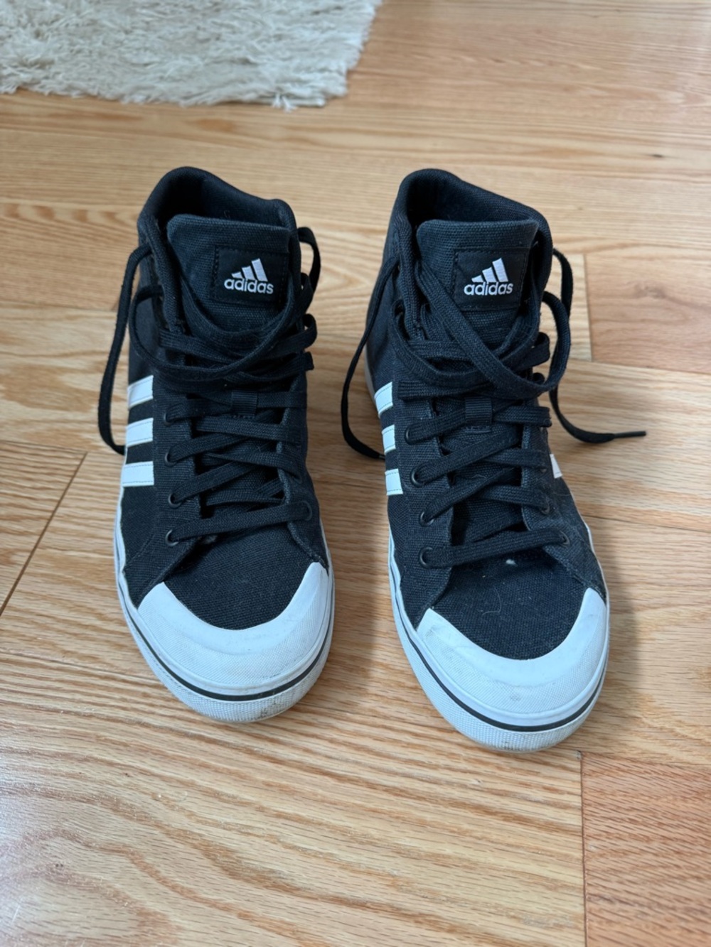 Adidas woman’s Black High-Top Sneakers with White Accents - barely worn